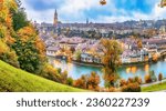 Fabulous autumn view of Bern city on  Aare river during evening with Cathedral of Bern on background. Location: Bern, Canton of Bern, Switzerland, Europe
