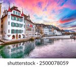 Fabulous historic city center of Lucerne with famous buildings and calm waters of Reuss river. Popular travel destination .  Location: Lucerne, Canton of Lucerne, Switzerland, Europe