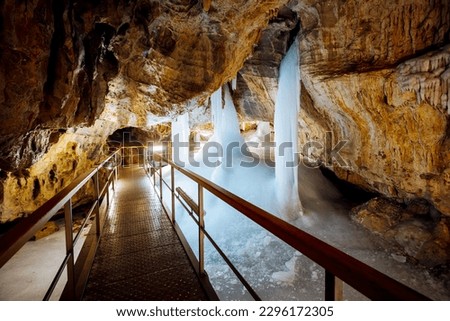 The fabulous underground world of the Demanovska ice cave with ice pillars. Location place Low Tatras National Park, Slovakia, Europe. Photo wallpaper. Famous landmarks. Discover the beauty of earth.