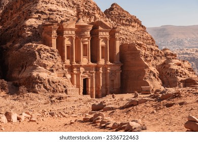 Facade of Ad-Deir Monastery in Petra Jordan. Monastery carved into sandy rocks is one of most famous sights of Petra.  Facade of Ad-Deira resembles Treasury - Powered by Shutterstock