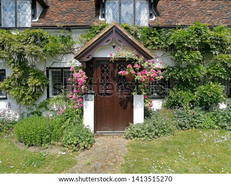 The facade of beautiful cottage in England, United Kingdom