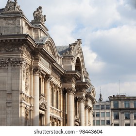 Facade Of The Bourse In Brussels With The Carved Entrance Arch