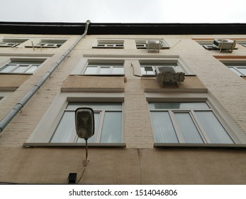 The facade of the building with windows.  Bottom view