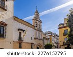 Facade of the Church of Santa Maria la Blanca in old city center of  Seville, Andalusia, Spain. Text HAC EST DOMUS DEI ET PORTA COELI 1741 means THIS IS THE HOUSE OF GOD AND THE GATE OF HEAVEN 1741