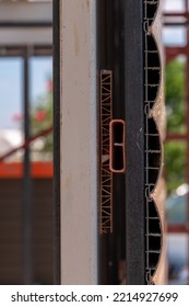 Facade Cladding Screwed Into An Iron Profile To Cover The Exterior Of A Building