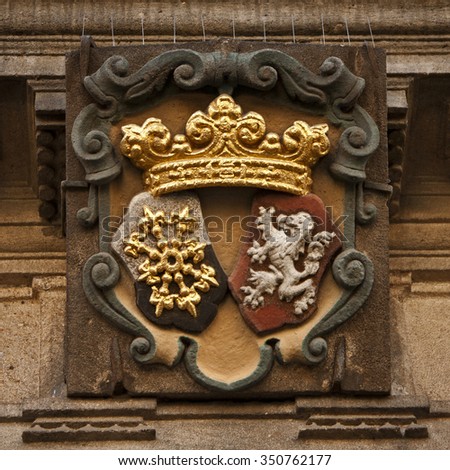 Facade coat of arms on historic building in Prague. Czech Republic