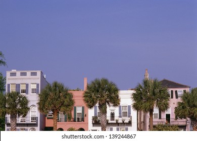 Facade Of Colorful Historic Houses In Charleston, SC