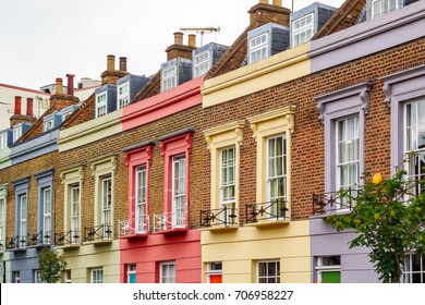 Facade of colourful terrace houses in Camden Town, a district of north west London - Shutterstock ID 706958227