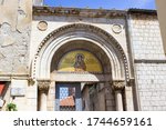 Facade of the entrance gate of the Euphrasian Basilica (also called Cathedral Basilica of the Assumption of Mary) in the old town of Porec (Parenzo), Croatia