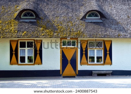 Facade of the estate farm of Heeswijk Castle with shutters in the colors of the estate Stock photo © 