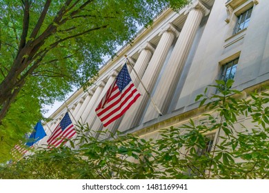 Facade Flags Robert F Kennedy Justice Department Building Pennsylvania Avenue Washington DC Completed in 1935. Houses 1000s of lawyers working at Justice.