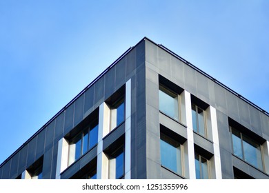 Facade fragment of a modern office building. Exterior of glass wall with abstract texture. - Shutterstock ID 1251355996