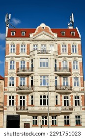 facade of a historic tenement house with balconies in the city of Poznan in Poland