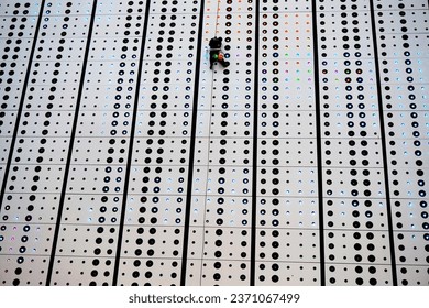 facade of the MBK store  replacement of bulbs