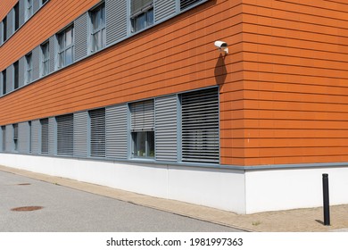 facade of a modern building with security camera 