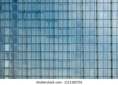 Facade Of A Modern Glass Fronted Office Building In Singapore.