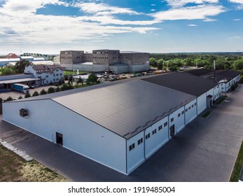 Facade of a modern navy blue warehouse - Powered by Shutterstock