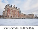 Facade of the New Palace (Neues Palais) in Sanssouci Park, Potsdam, Germany. Winter and snow.