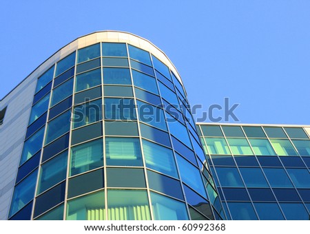 Facade of office building on a background lightblue sky