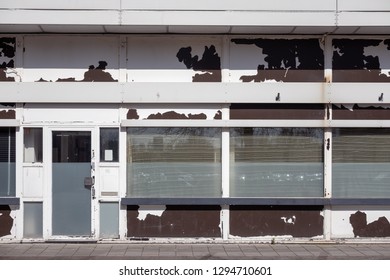 Facade Of Old Abandoned Business Establishment In Lelystad, The Netherlands