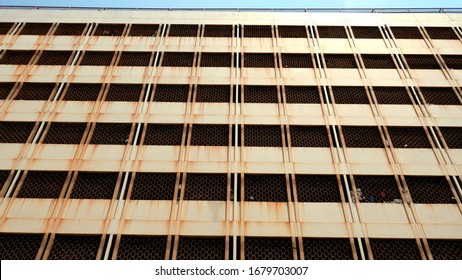 Facade Of An Old Apartment And Sky In A Sunny Day,Pra Nakhon, Bangkok, Thailand. Flats For Low-income People Of Lower Middle Class. Turn Up Angle Building Picture (view From Below).
