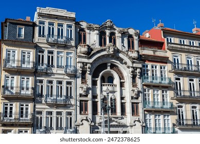 Facade of old classic buildings in the old town of Porto or Oporto, Portugal - Powered by Shutterstock