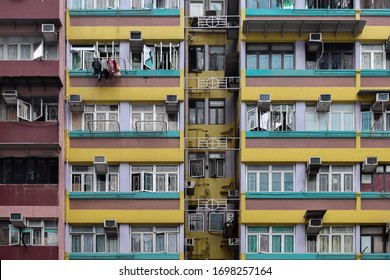 Facade of old colourful tenements near Hennessy Road, Wan Chai, Hong Kong