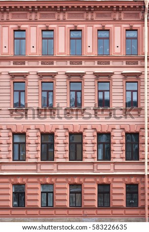 The facade of the old house. The Windows and decoration of walls