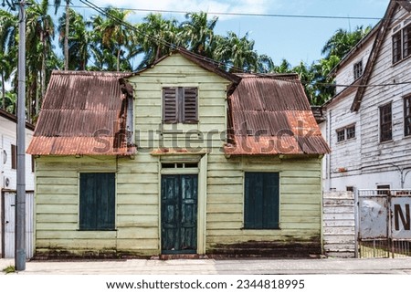 Facade of an old wooden house in the historic center of Paramaribo, Suriname, South America