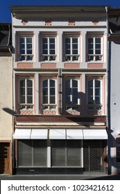 Facade from the period of historicism with latticed ground floor in Trier, Germany