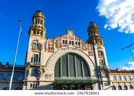 The facade of Prague Main Railway Station - Art Nouveau architecture. Historic station with features elaborate decorative elements, intricate detailing, and grand arches that reflect the elegance and