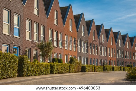 Facade in row of Modern Real Estate Family houses in a suburban area in Europe