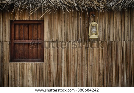 Facade of a traditional arabian home made with palm leaves.