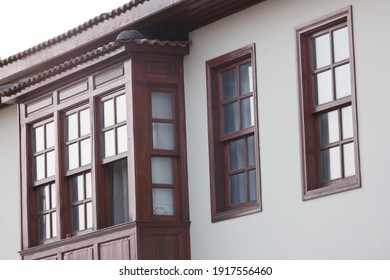 Facade of traditional house at turkish town. Windows of ottoman style house.