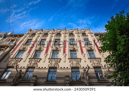 Facade of a typical art-nouveau residential building, also called jugendstils riga, in the art nouveau district of the latvian capital city, known for its secession style.