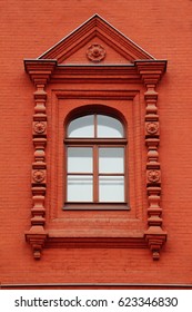 Facade. Window of an old brick castle