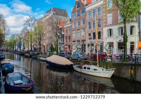 Similar – Foto Bild Architektur niederländischer Häuser und Hausboote am Amsterdamer Kanal