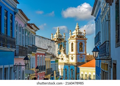 Facades of the houses, towers and churches of ancient district of Pelourinho in the beautiful city of Salvador, Bahia - Shutterstock ID 2160478985
