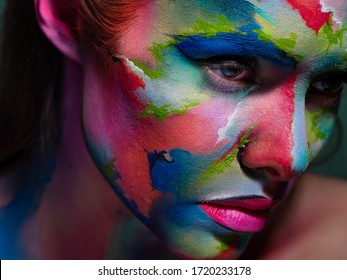 Face Art And Body Art. Creative Makeup With Colorful Patterns On The Face. Modern Makeup Art, Bold Style, Close-up Portrait Of A Woman