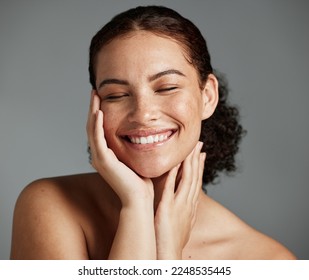 Face, beauty and satisfaction with a model black woman in studio on a gray background to promote natural skincare. Facial, wellness and makeup with an attractive young female happy with cosmetics