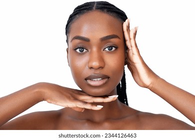 Face building. Facial gymnastic. Self massage. Skin lifting.  Skincare procedure. Beauty portrait of African American young woman with braids hairstyle is showing face symmetry gesture