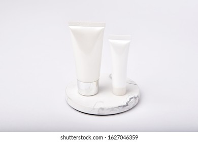 Face Cleanser, Cosmetics Bottle Containers Packaging Isolated On White Background, Blank Label For Branding Mock-up, Skincare Beauty Product Concept.