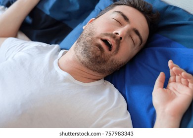 Face Close Up Of Snoring Man Because Of Hypopnea Disorder