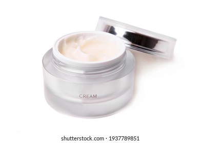 Face Cream In A Jar Isolated On White Background.