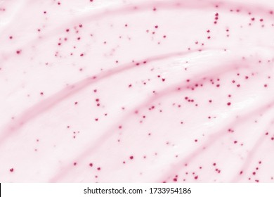 Face Cream Scrub Texture Background. Pink Color Exfoliating Skincare Product Smear Smudge. Gentle Creamy Scrub Cleanser Sample Closeup