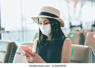 Face Detection On Smartphone Concept. Identity Scan Young Adult Asian Woman Wear Face And Mask. Her Check In By Mobile Phone For Start Travel. Background At Airport Terminal