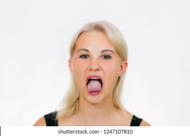 Face Exercise Jaw Release, Woman With Closed Mouth And Tongue Is Pressed Against Bottom Teeth