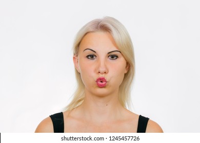 Face Exercise Rapid Breathing, Funny Female Face Expression With Blowing Air Mouth Close-up