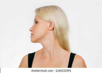 Face Exercise, Woman Turn Head To Left And  Shift Bottom Jaw Close-up