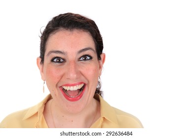 Face Forward Headshot Of A Smiling Spanish Woman With Dark Hair Brown Eyes Wearing A Yellow Blouse